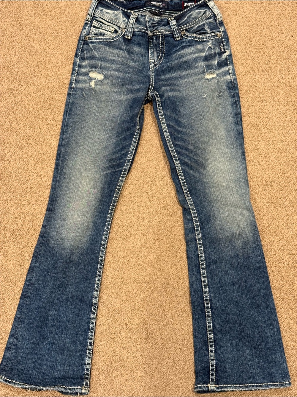 Silver Jeans Women's Flare Denim in Faded Blue with Distress